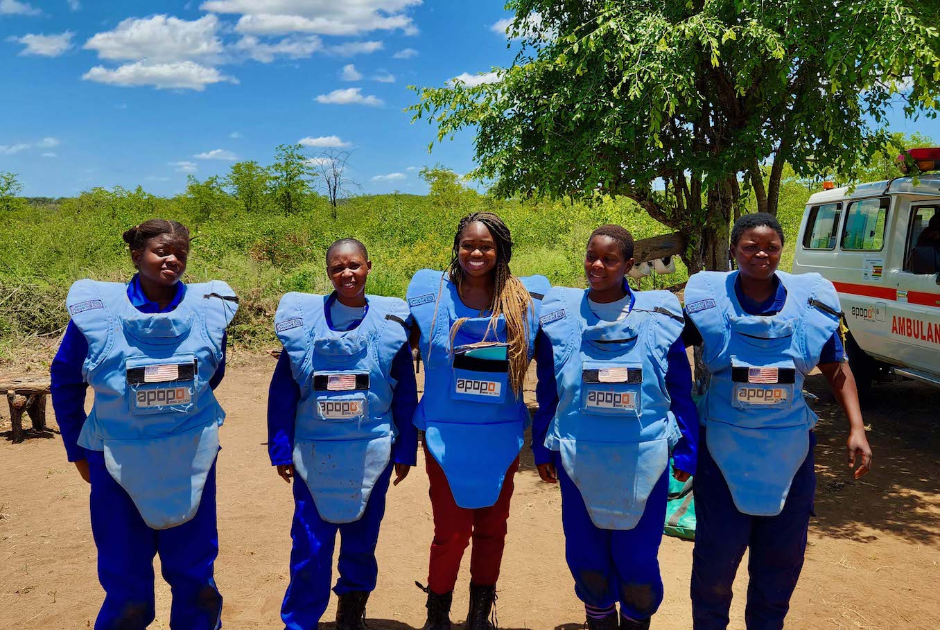 PM/WRA's Aisha Kamara, accompanied by some of APOPO's female demining staff