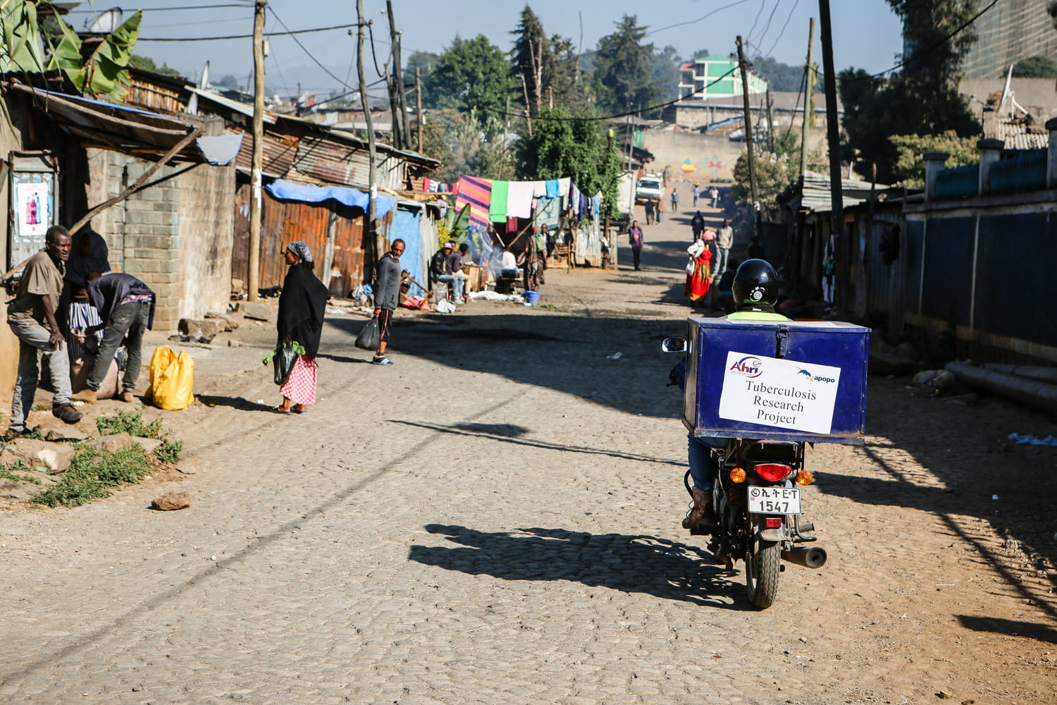 AHRI-APOPO Ethiopia tuberculosis sample collector drives through Addis Ababa