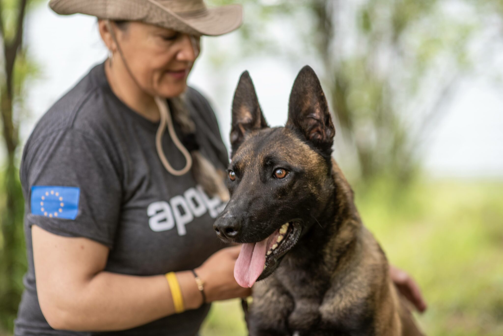 APOPO Mine Action female TSD handler Consuelo and her dog