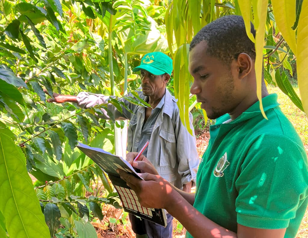 Student Haji carried out a soil sample analysis at APOPO's demo syntropic farm