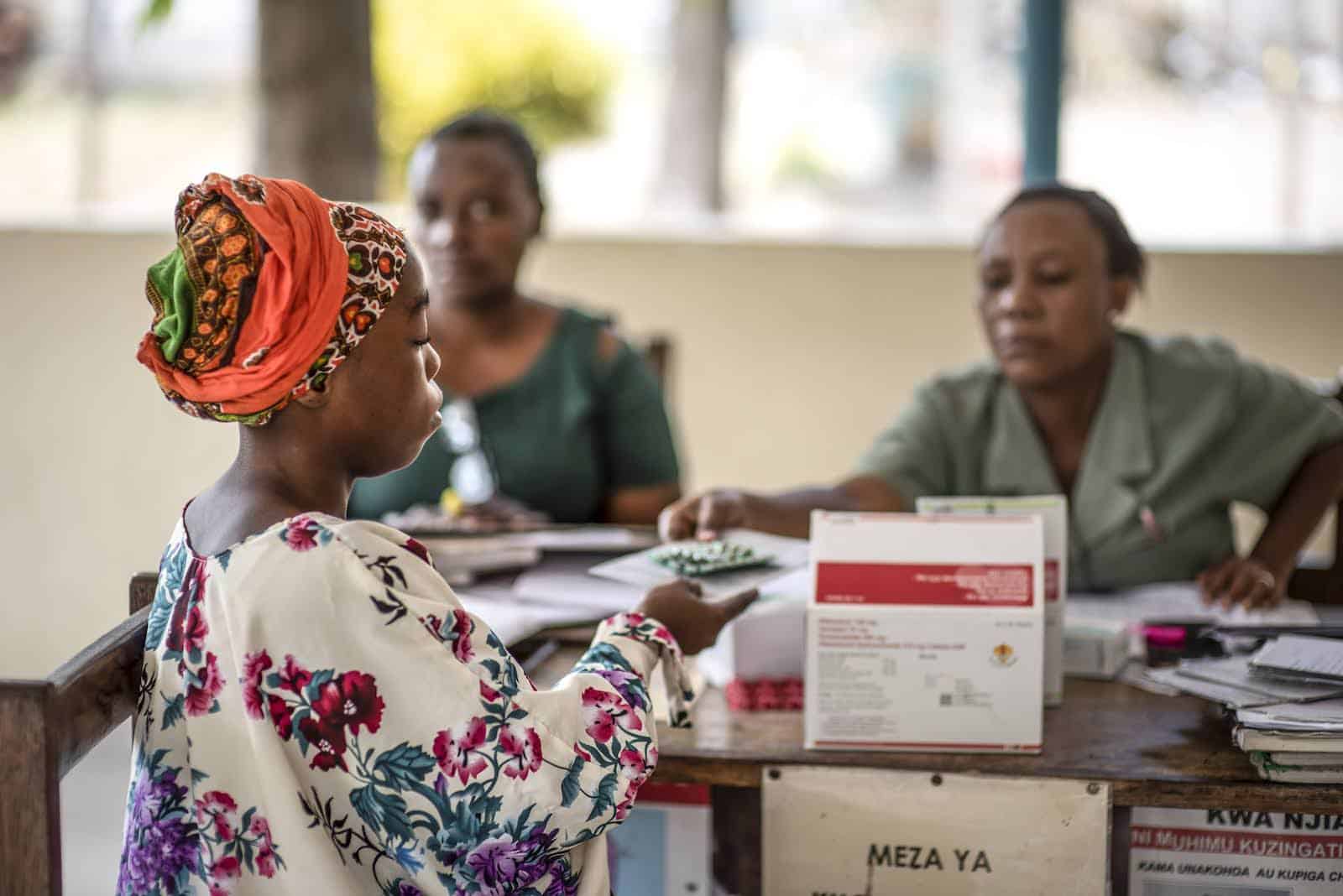 Patient at DOTs clinic receives TB treatment subsidized by the Tanzanian government.