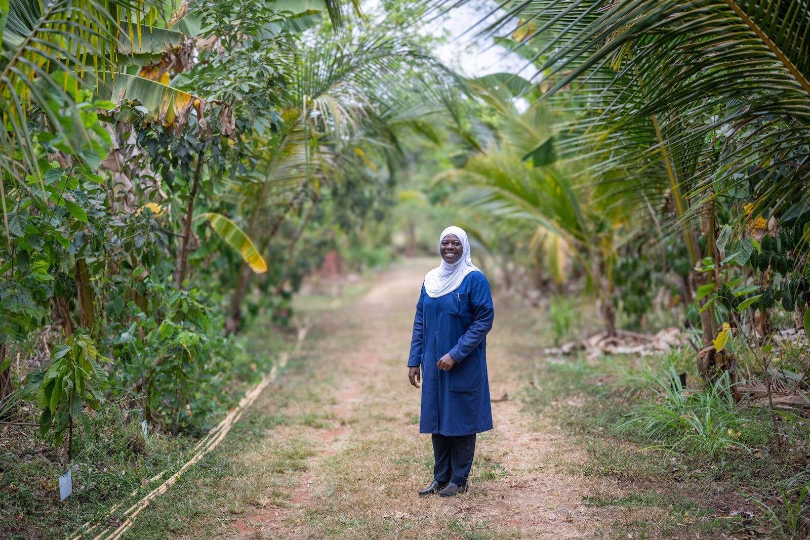 APOPO HeroTREEs intern Maliha at demo plot where she is carrying out a study